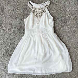 Formal white mini dress with jeweled halter